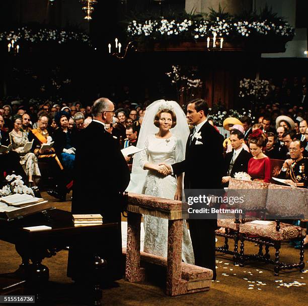 General views of Crown Princess Beatrix and her husband, Claus von Amsberg, during their March 10 civil wedding ceremony. The occasion was marred by...