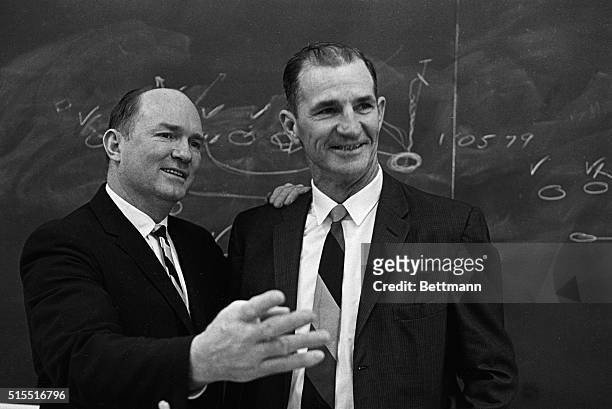 Detroit Lions head football coach Harry Gilmor introduces Sammy Baugh , famed passing star, who was named 2/10 to the Detroit Lions coaching staff....