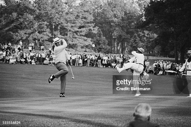 Dancing with delight, Jack Nicklaus and his caddie celebrate the birdie on the 15th hole, as Nicklaus staved off a last ditch charge by Tommy Jacobs...