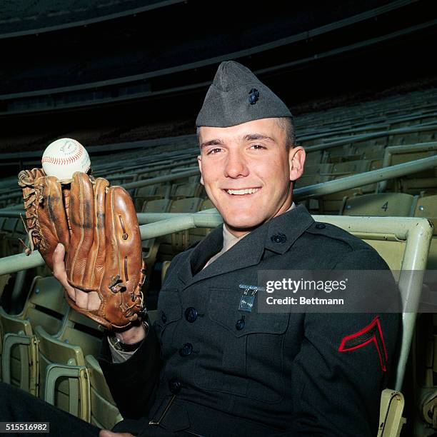 Frank "Tug" McGraw sits in the stands at Shea Stadium. McGraw, in his Marine uniform en route to Camp Lejeune, N.C., was the first New York Met to...