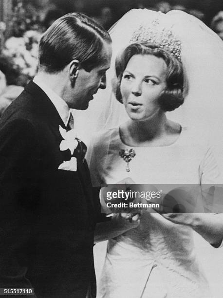 Ring Fails Fit-Ness Test. Amsterdam: Princess Beatrix finds the ring a bit too small as she tries to fir it on the hand of her husband, Claus Von...