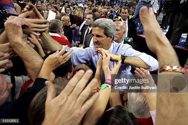 Democratic presidential candidate U.S. Senator John Kerry greets supporters during a rally at the University of Nevada October 22, 2004 in Reno,...