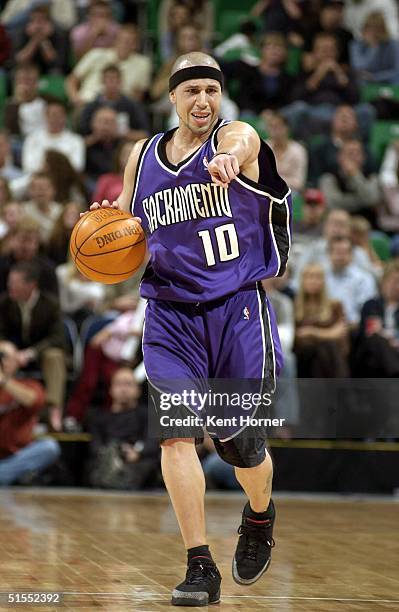 Mike Bibby of the Sacramento Kings directs the offense against the Utah Jazz on October 22, 2004 at the Delta Center in Salt Lake City, Utah. NOTE TO...