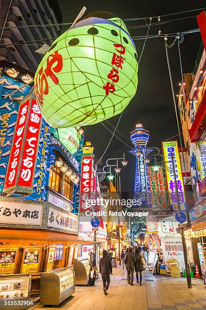 japan bunte neonlichter hektischen nachtleben shinsekai tsutenkaku turm osaka - osaka shinsekai food stock-fotos und bilder