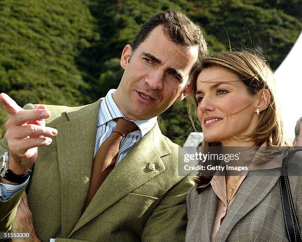 In this handout photo, Crown Prince Felipe and Princess Letizia of Spain visit the rural village of Villar de Vildas, chosen as the Best Asturian...