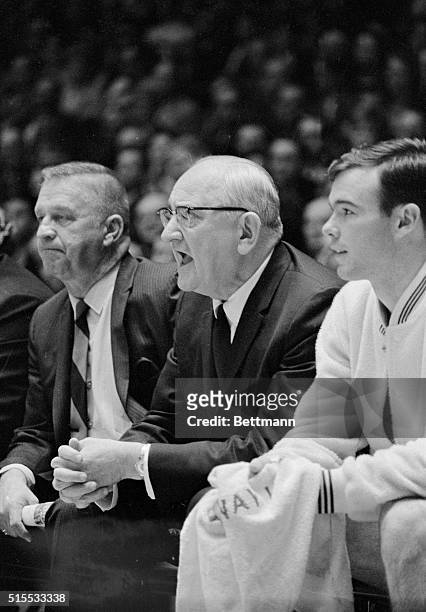 This photo shows the basketball coach Adolph Rupp of Kentucky University, during a basketball game from the sidelines.