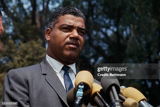 Whitney Young, executive director of the National Urban League, talks to newsmen shortly after reporting to President Johnson, July 26th. Young said...