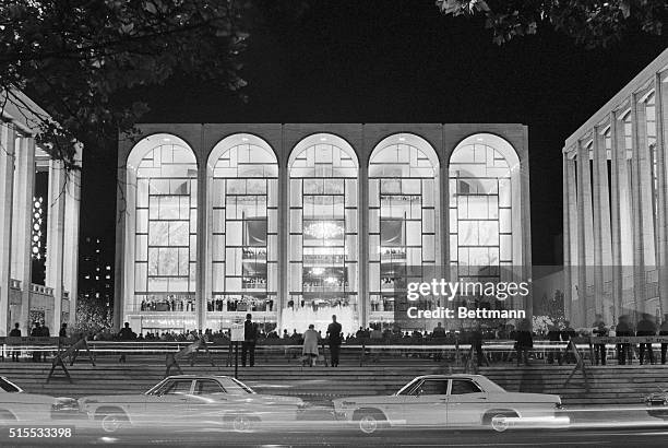 The new Metropolitan Opera House at Lincoln Center glows here in the night during its opening September 16th. The $46 million house was filled with...