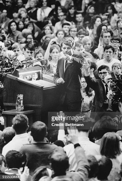Senator Robert F. Kennedy points to a student during a question and answer period after Kennedy spoke at the University of Kansas. Part of the...