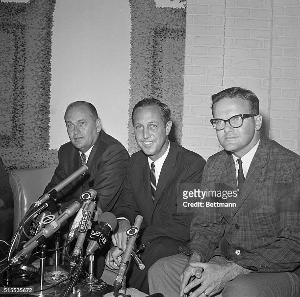 From left to right here is Tex Schramm, President of the National Football League, of the Dallas Cowboys; NFL Commissioner Pete Rozelle; and Lamar...
