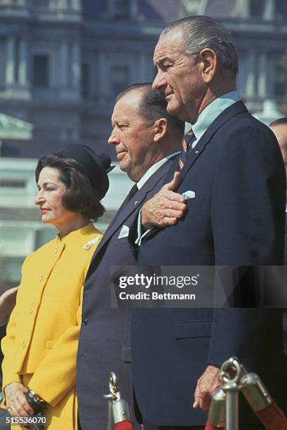 Washington, D.C.: President Alfredo Stroessner of Paraguay stands with President and Mrs. Johnson during welcoming ceremonies outside the White...