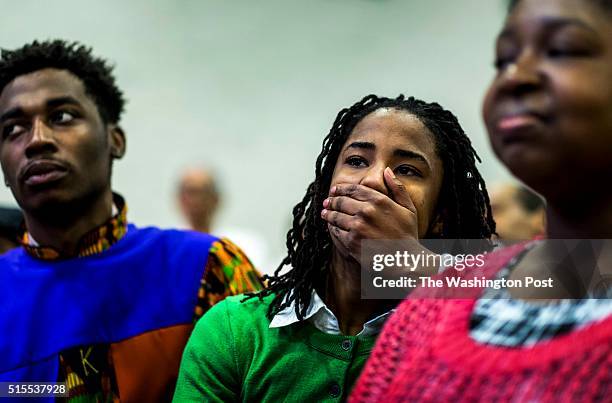 In a suburb of Cleveland, the congregation listens to former Secretary of State Hillary Clinton during morning services at Mount Zion Fellowship...