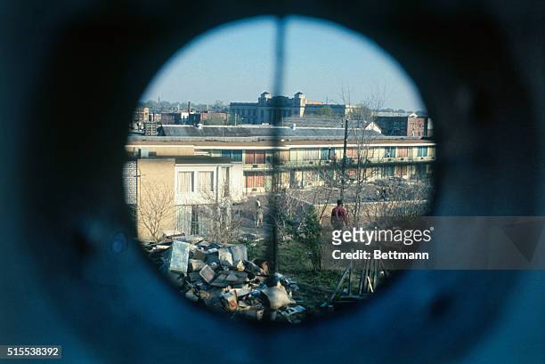 View through a simulated telescopic gunsight shows what the killer of Dr. Martin Luther King may have seen just before he fired the fatal bullet on...