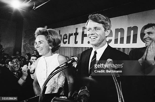 An exuberant Robert F. Kennedy addresses an enthusiastic throng at campaign headquarters after Indiana primary election victory. At left is Kennedy's...