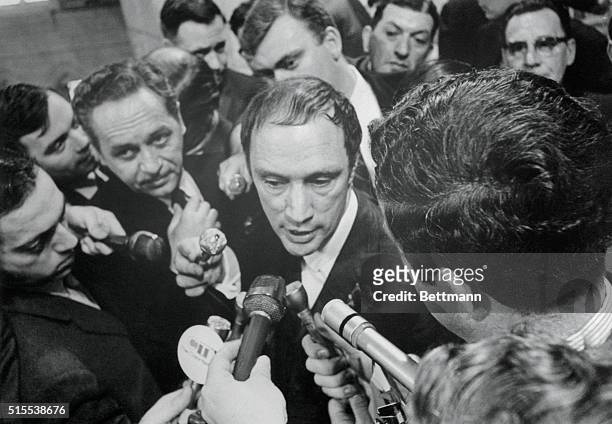 Prime Minister Pierre Elliott Trudeau talks to newsmen after announcing in the House of Commons that Parliament is dissolved and that a general...