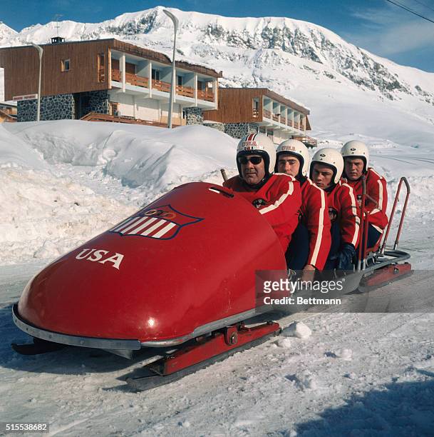 America's No. 1 four-man bobsled team practice-starts on a side road. Members of the four-man team are: Boris Said, Dr. David Dunn, Robert Crowley,...