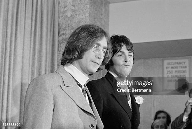 Beatle business...Beatles John Lennon and Paul McCartney face the press here, May 14th, and announce the establishment of an organization to serve as...