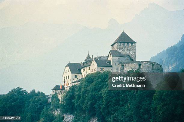 Vaduz, Liechtenstein: General view, the Liechtenstein Castle, situated atop wooded hilltop, is the home of the Liechtenstein royal family.