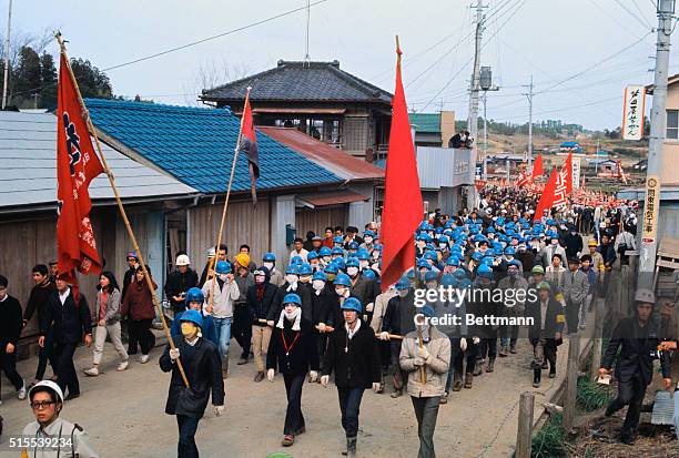 Japanese riot police clashed today with militant leftist students protesting plans to build a Tokyo International Airport in this suburban town....