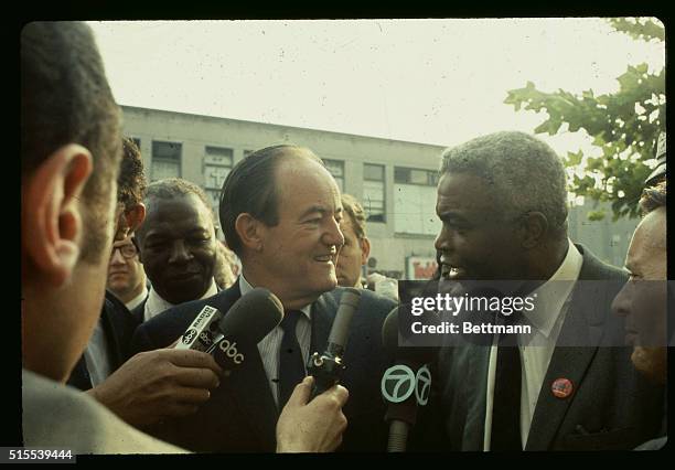 Jackie Robinson, welcomes Vice President Hubert Humphrey here to Harlem, where Humphrey will accept the endorsement of Jackie Robinson. Robinson in...