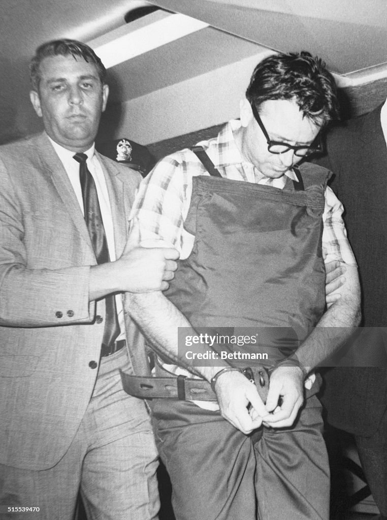 James Earl Ray Led to Cell in Handcuffs