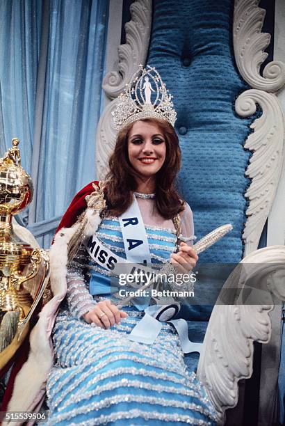 Miss Universe of 1968, Martha Yasconcellos of Brazil, has received her trophy here. She was named over 64 other beauties from around the world on...