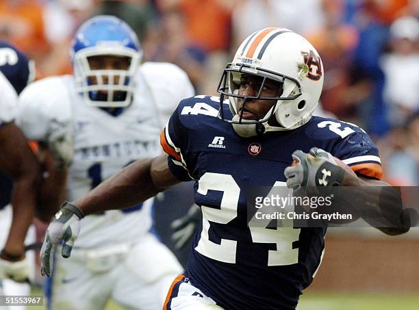 Carnell Williams of Auburn Tigers runs for a first down against Kentucky Wildcats on October 23, 2004 at Jordan-Hare stadium in Auburn, Alabama....
