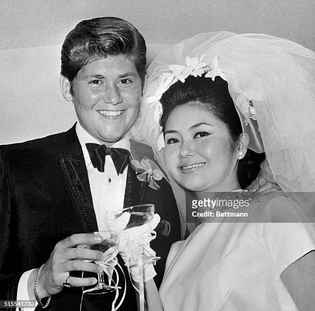 Singer Wayne Newton married former airline stewardess Elaine Okamura in a quiet ceremony at the Little Church of the West in Las Vegas, Nev., today....