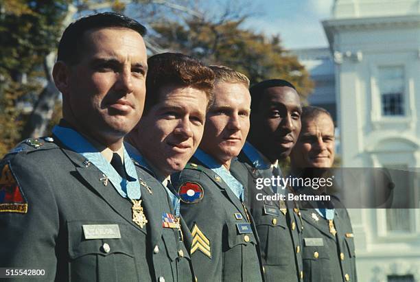 Washington: These five Army heroes were presented with the Medal of Honor for heroism in Vietnam by Pres. Johnson at the White House. Shown outside...