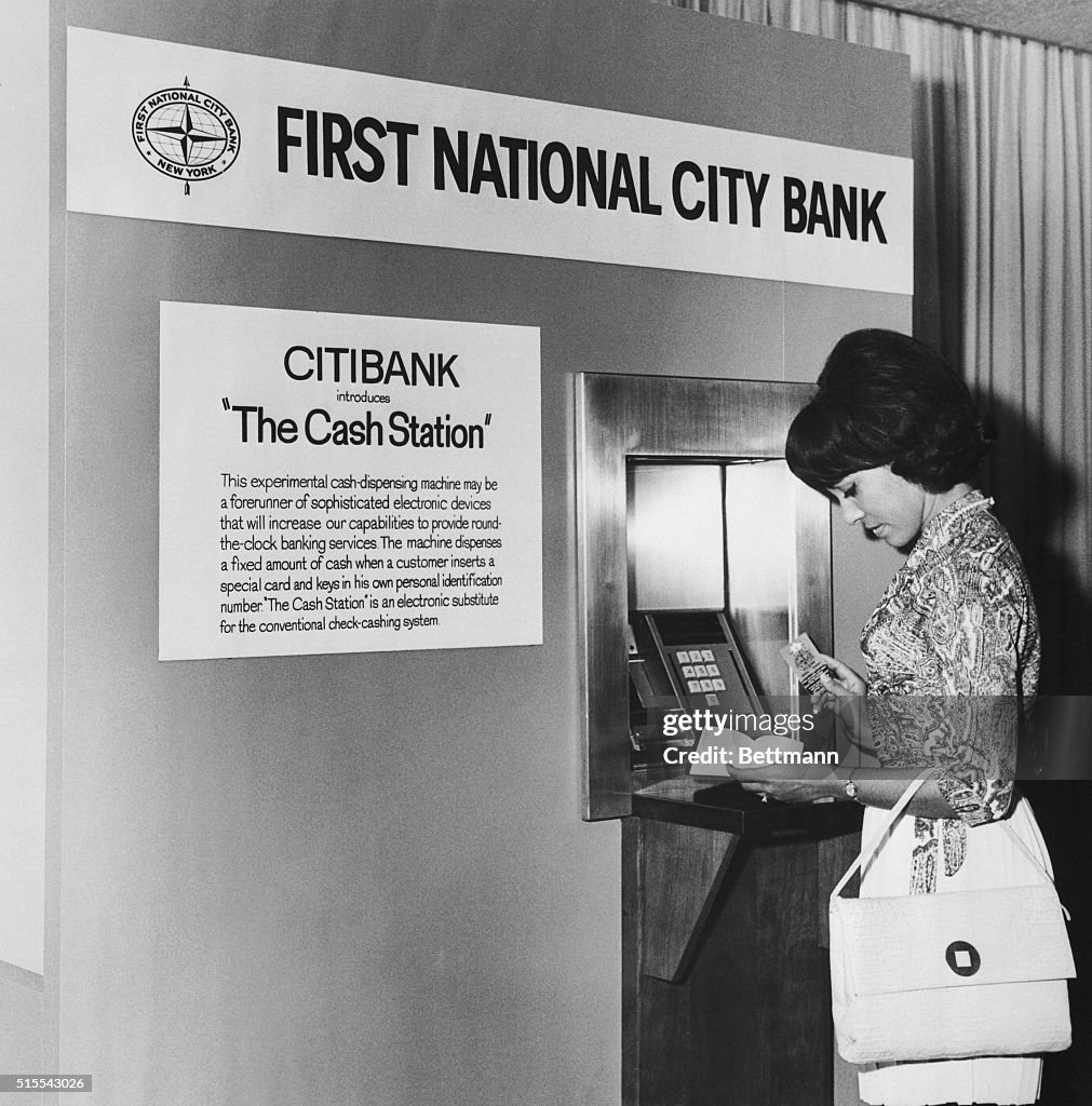Woman Withdrawing Money from "Cash Station"
