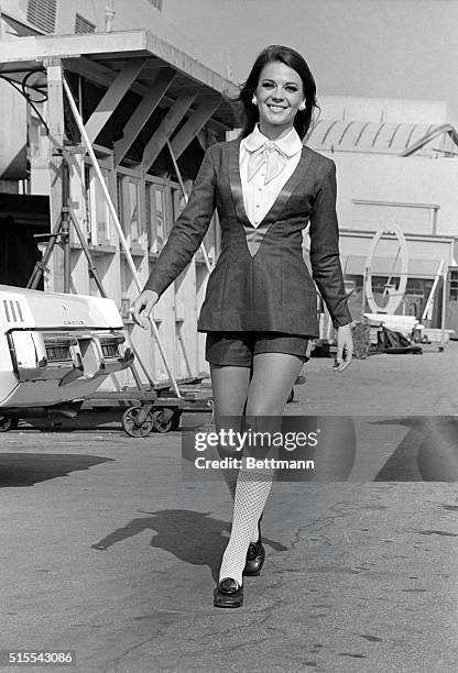 & Nice. Hollywood: Actress Natalie Wood walks to her dressing room in an outfit designed for her new movie, Bob & Carol &Ted & Alice, currently being...