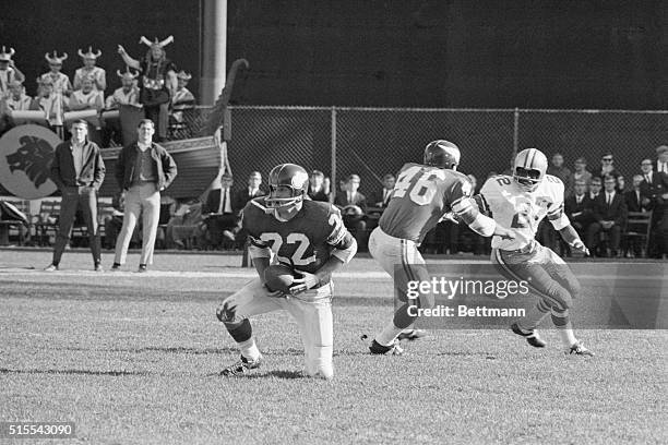 October 20 Minneapolis, Minnesota: Vikings Paul Krause holds the ball in his belly after intercepting a Don Meredith pass intended for Bob Hayer...