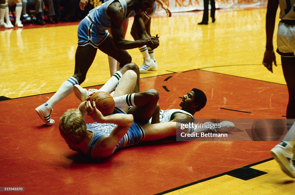 Larry Bird Scrambling to Get up from Floor