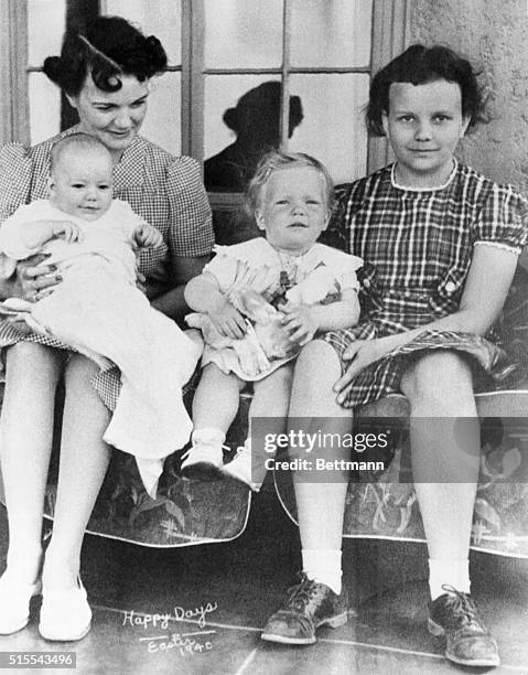 Sandra Day O'Connor is shown in family album picture from Easter 1940, taken on family ranch. Her mother, Ada Mae Day, holds brother Alan, who now...