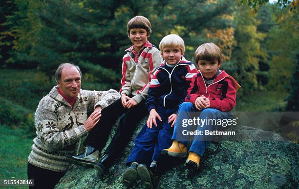 Canadian Prime Minister Pierre E. Trudeau joins sons Justin, Sacha, and Michel in this photo for his 1980 Christmas card. Justin and Sacha will be...