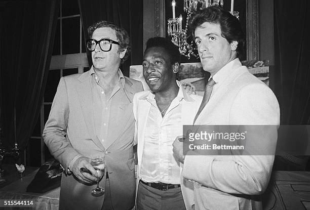 Michael Caine, soccer great Pele, and Sylvester Stallone at a party celebrating the 7/16 opening of the film "Victory" in which all three star.