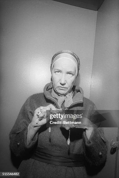 Edie Bouvier Beale, daughter of the late Edith Bouvier Beale, aunt of Jackie Onassis, displays some of the six pieces of jewelry that will be...