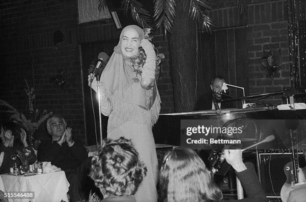Edith Bouvier Beale sings during her debut at Reno Sweeney, a Greenwich Village nightspot. She opened a six-day engagement. A few years ago Miss...