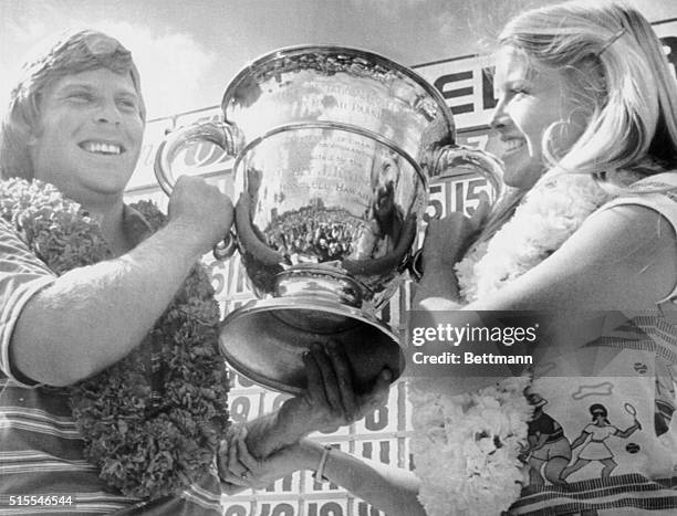 Jubilant Ben Crenshaw and his wife Polly celebrate his Hawaiian Open win. Crenshaw fired a final round 66 for a 72 hole total of 270, breaking a...
