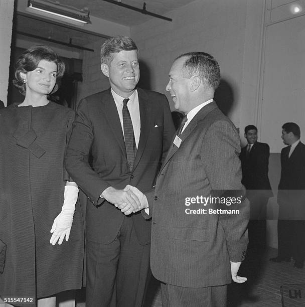 Senator John F. Kennedy and wife Jacqueline are greeted by Leonard H. Goldenson, President of ABC Paramount Theatres as the candidate arrived at...
