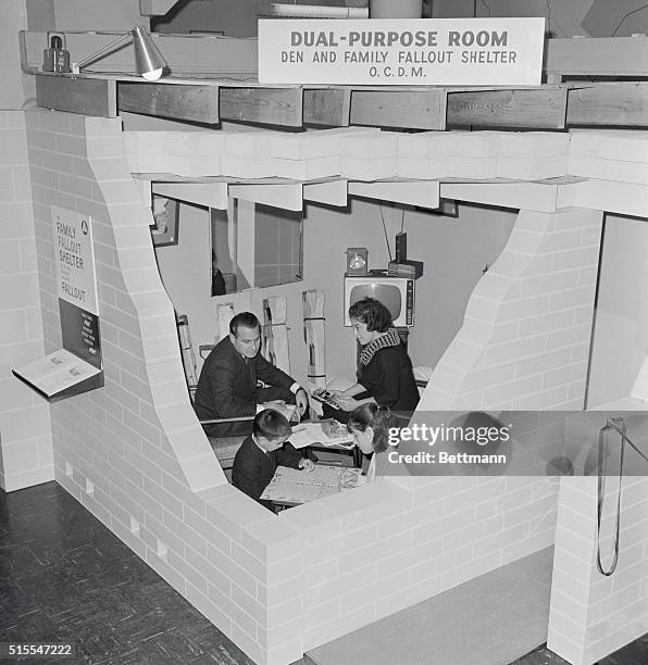 Design for living. New York, New York: Mr. And Mrs. Nathaniel Schaff, Eric and Diane sample dual purpose room-den and family fallout shelter -- put...