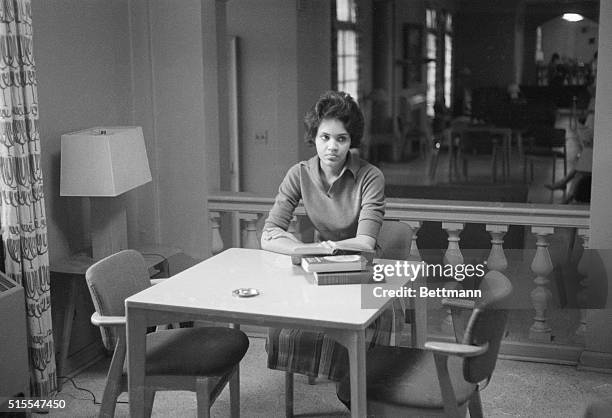 Photographers and reporters follow around Charlayne Hunter as she walks to class at University of Georgia. The negro girl, under court order to be re...