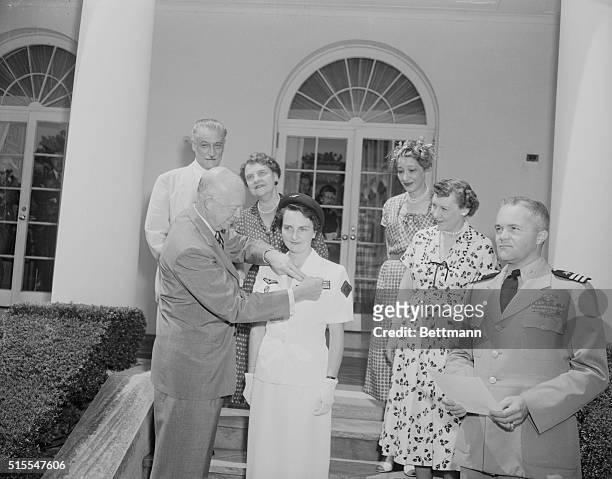President Eisenhower awarding the Medal of Freedom to French Air Force Nurse Genevieve De Galard-Terraube the Angel of Dien Bien Phu for her service...