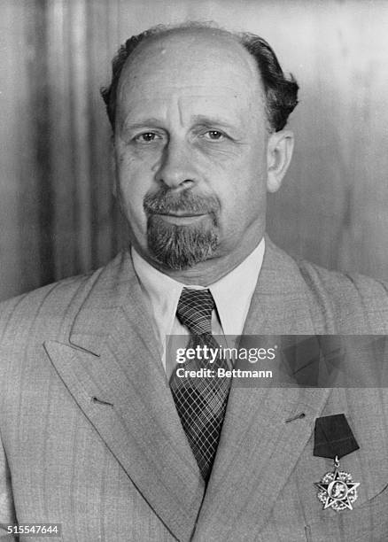 Deputy Minister President in East Germany and Secretary General of the Communist Party Central Committee is shown wearing the Karl Marx Medal.