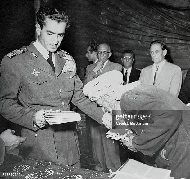 In a program designed to pull the rug from under Communist agitators, the Shah of Iran is breaking up vast tracts of land and distributing parcels to...