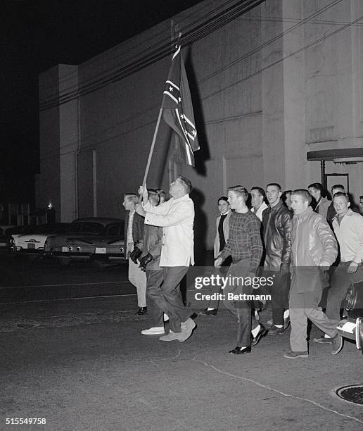 Athens, Georgia: University of Georgia students parade in downtown Athens with Confederate flag in protest of alleged rumor stating that Governor...