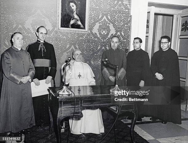 His holiness, Pope Pius XII is shown as he delivered a radio message from his summer residence at Castelgandolfo, to the Marian Congress in progress...