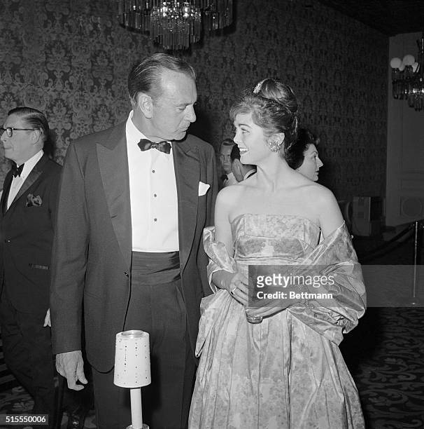 Proud father, Gary Cooper talks with his daughter, Maria during the party. Cooper was cited by the Friars for his patriotic and philanthropic...