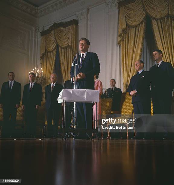 Swears in New Cabinet. Washington, D.C.: Chief Justice Earl Warren swears in new Kennedy cabinet in White House ceremony. Left to right are: Dean...