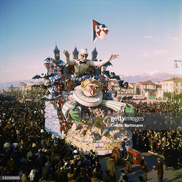 Italy's Big Carnival. Viareggio, Italy: An allegoric float dedicated to the vampire fad, represents a big top hated sharp toothed "Dracula"...